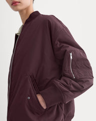 womens-renew-oversized-puffer-bomber-deep-plum
