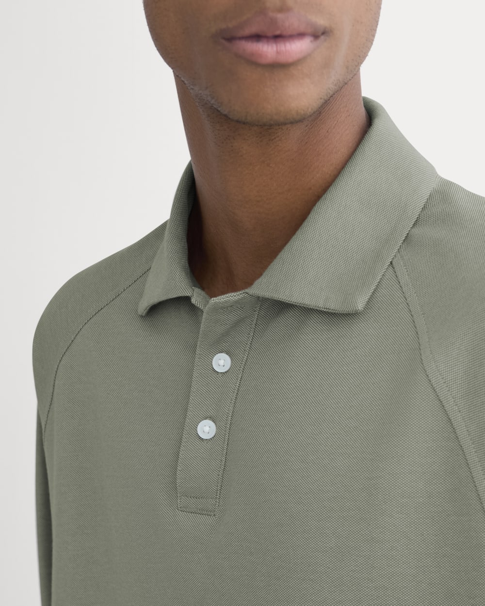 mens-startup-raglan-polo-chambray-deep-lichen